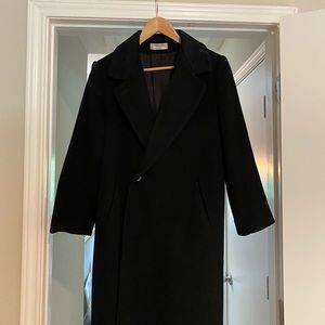 Wool coat vintage. No tears, but it needs new buttons.